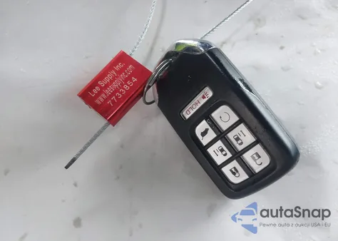 2018 Honda Odyssey Elite z USA, uszkodzony, nr VIN 5FNRL6H97JB092747